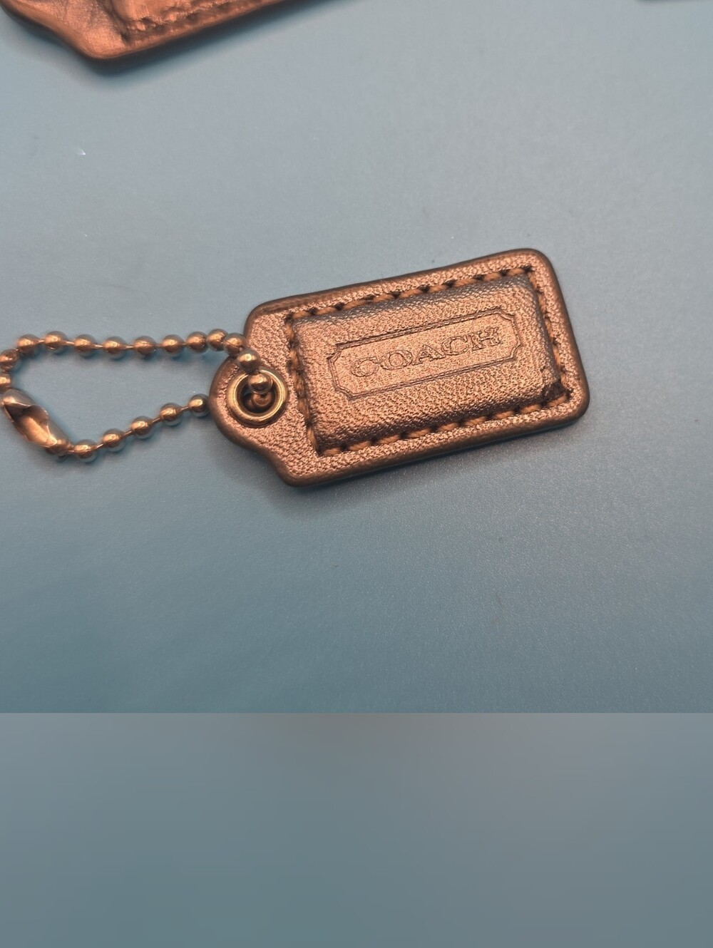 Coach Metallic Silver Leather Key Tag